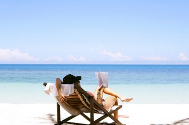 https://unsplash.com/photos/woman-sits-on-brown-wooden-beach-chair-jL6PTWI7h18?utm_content=creditShareLink&utm_medium=referral&utm_source=unsplash