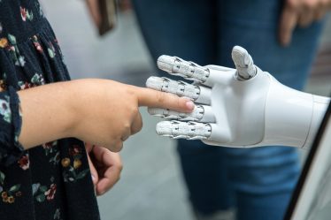 https://unsplash.com/photos/a-person-holding-a-robotic-hand-in-front-of-a-mirror-_7ceGXTAtyQ?utm_content=creditShareLink&utm_medium=referral&utm_source=unsplash