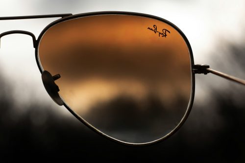 https://unsplash.com/photos/a-pair-of-sunglasses-with-a-reflection-of-a-cloudy-sky-5eqjmNigQoA?utm_content=creditShareLink&utm_medium=referral&utm_source=unsplash