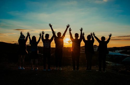 a group of happy people meditation affirmation rich cancer free